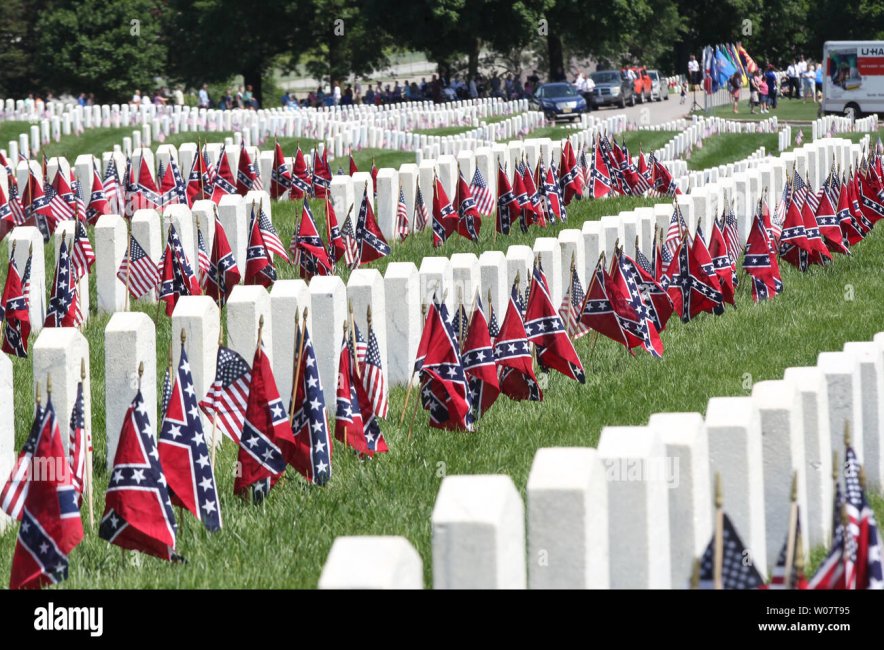confederate-flags-line-grave-sites-in-the-confederate-section-of-jefferson-barracks-national-c...jpg