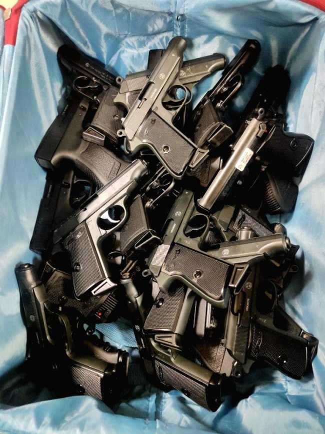 nearly-4-dozen-hand-guns-seized-at-delhi-airport-from-2-passengers-1405958.jpg