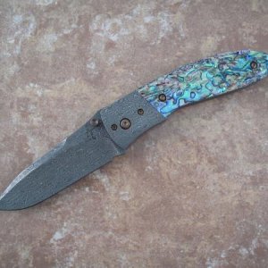 Greg Lightfoot Suppressor with abalone handles and Devin Thomas "Vine & Roses" Damascus blade.