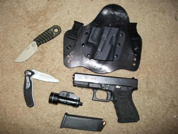My carry stuff

Glock 23
Kershaw Zing
RAT Izula
TRL-1
Crossbreed Supertuck holster
