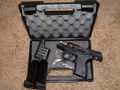 Taurus PT140 S&W 40cal with two 10 shot clips, speed loader and carrying case.