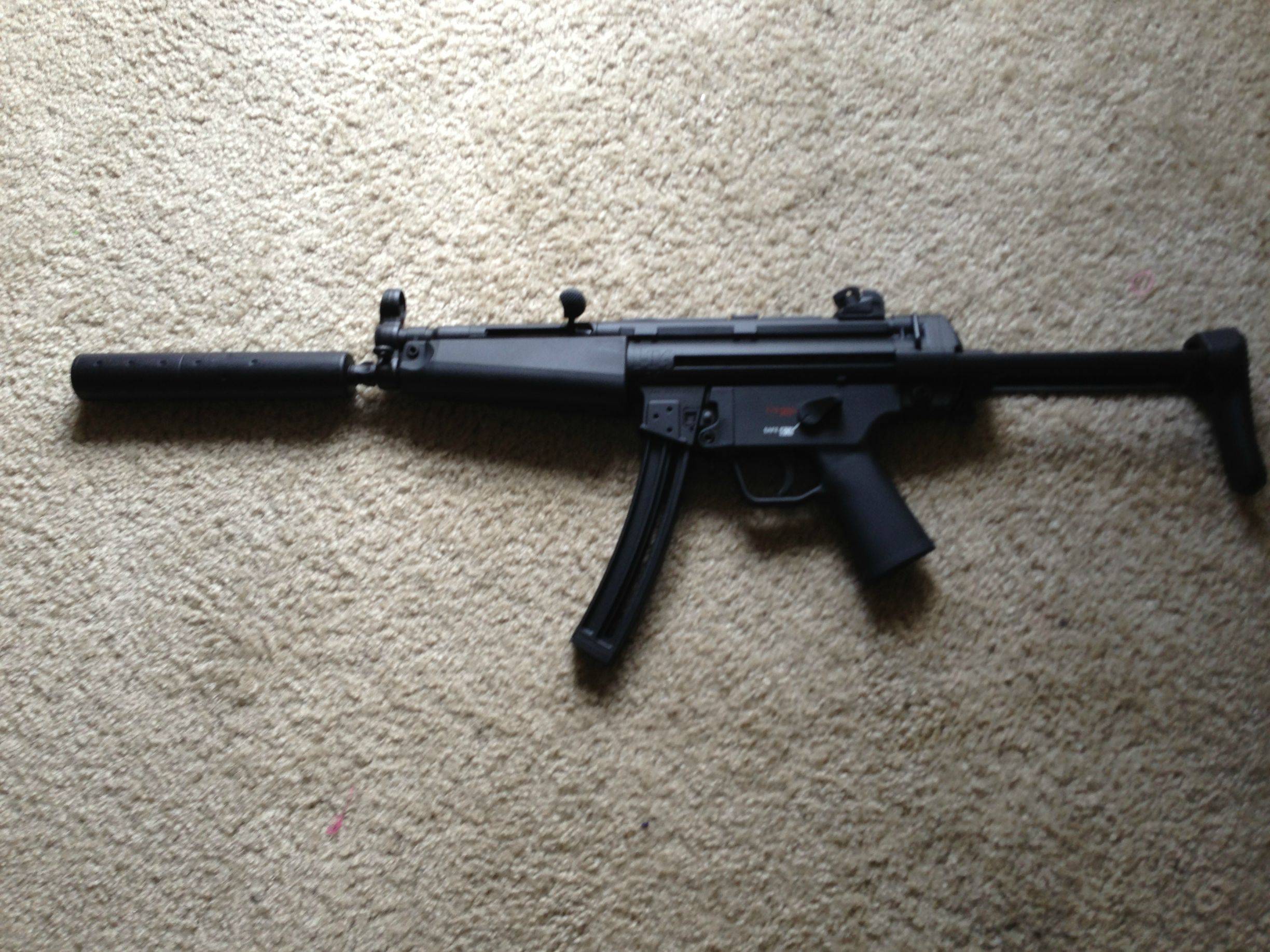 I have an H&K MP5-SD clone chambered in .22LR, this is a BLAST to shoot...