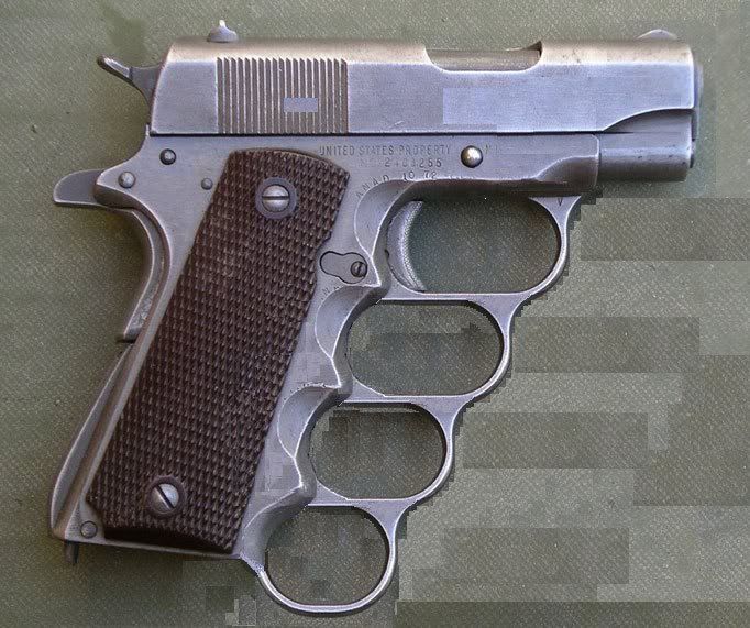 M1911A1-Knuckles-1911-Pistol.jpg