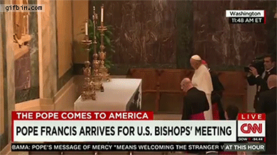 1444064429_pope_francis_table_cloth_trick.gif