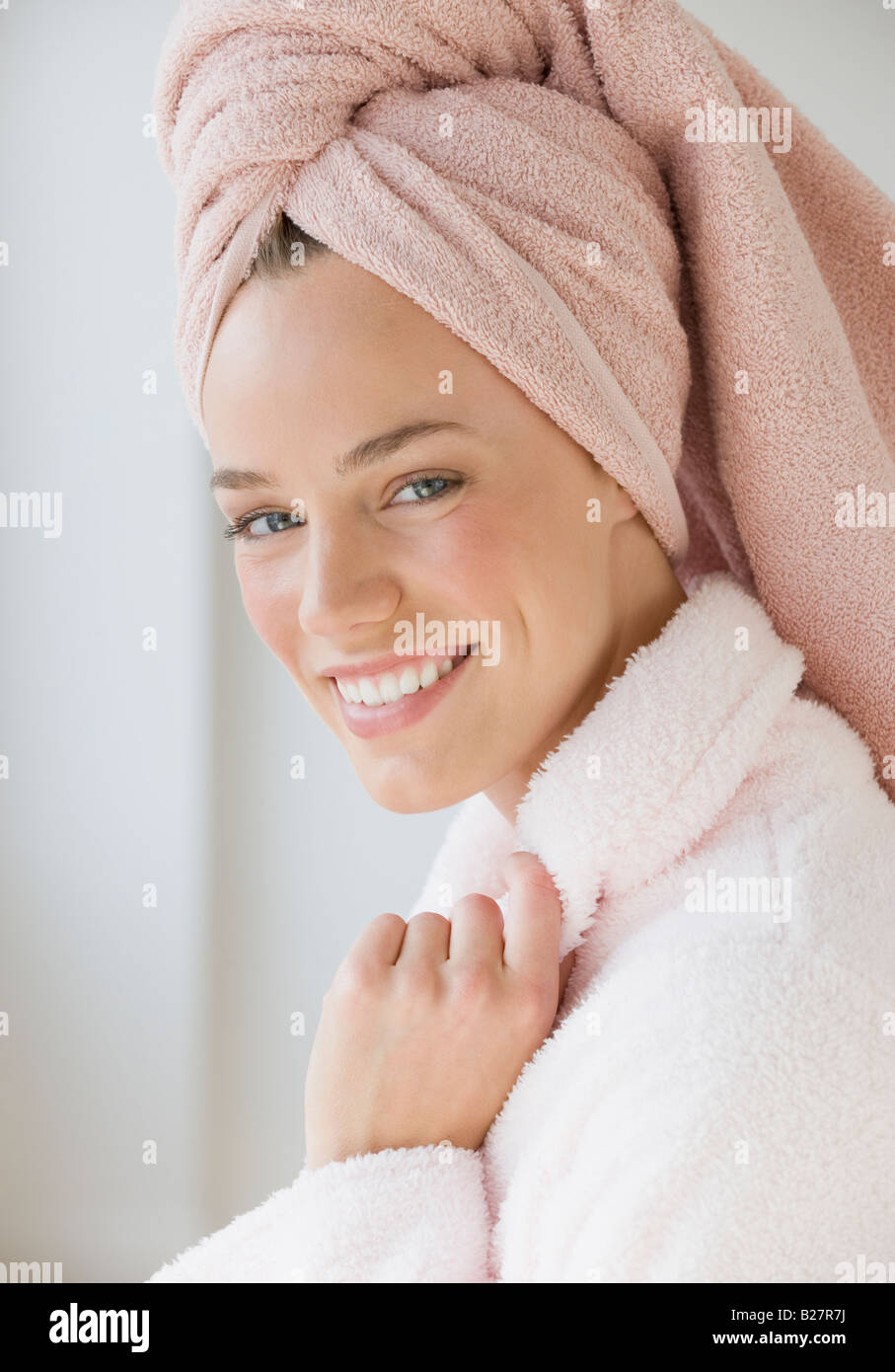 woman-with-towel-wrapped-around-hair-B27R7J.jpg