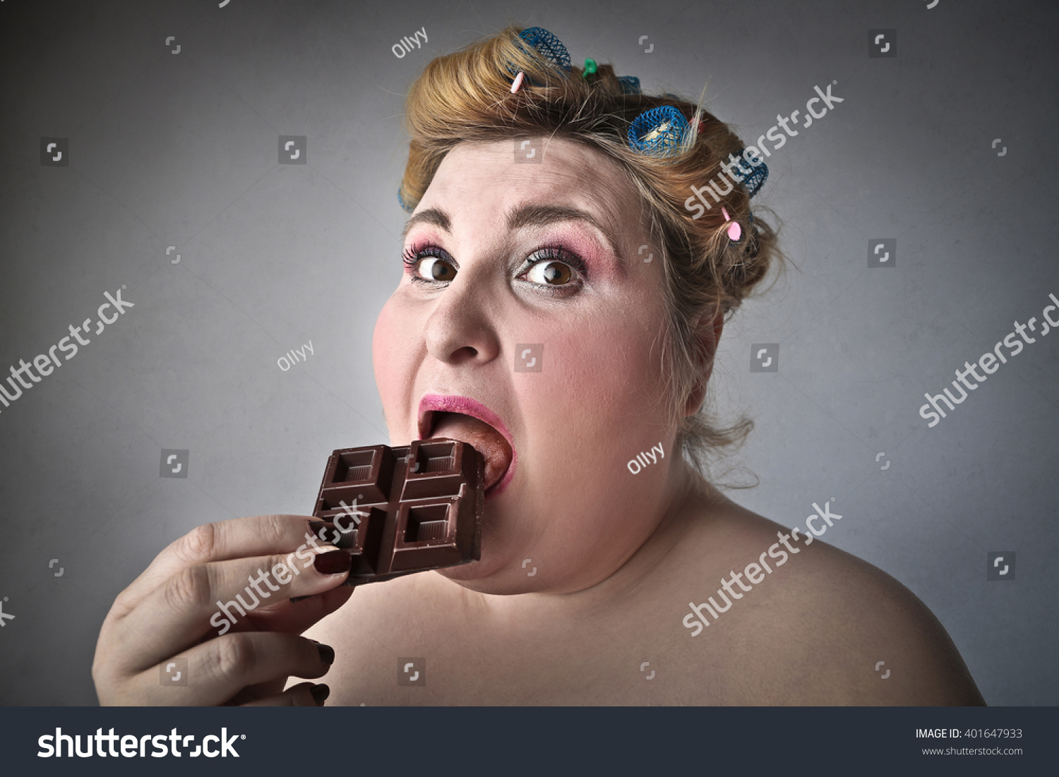 stock-photo-chubby-woman-eating-chocolate-401647933.jpg
