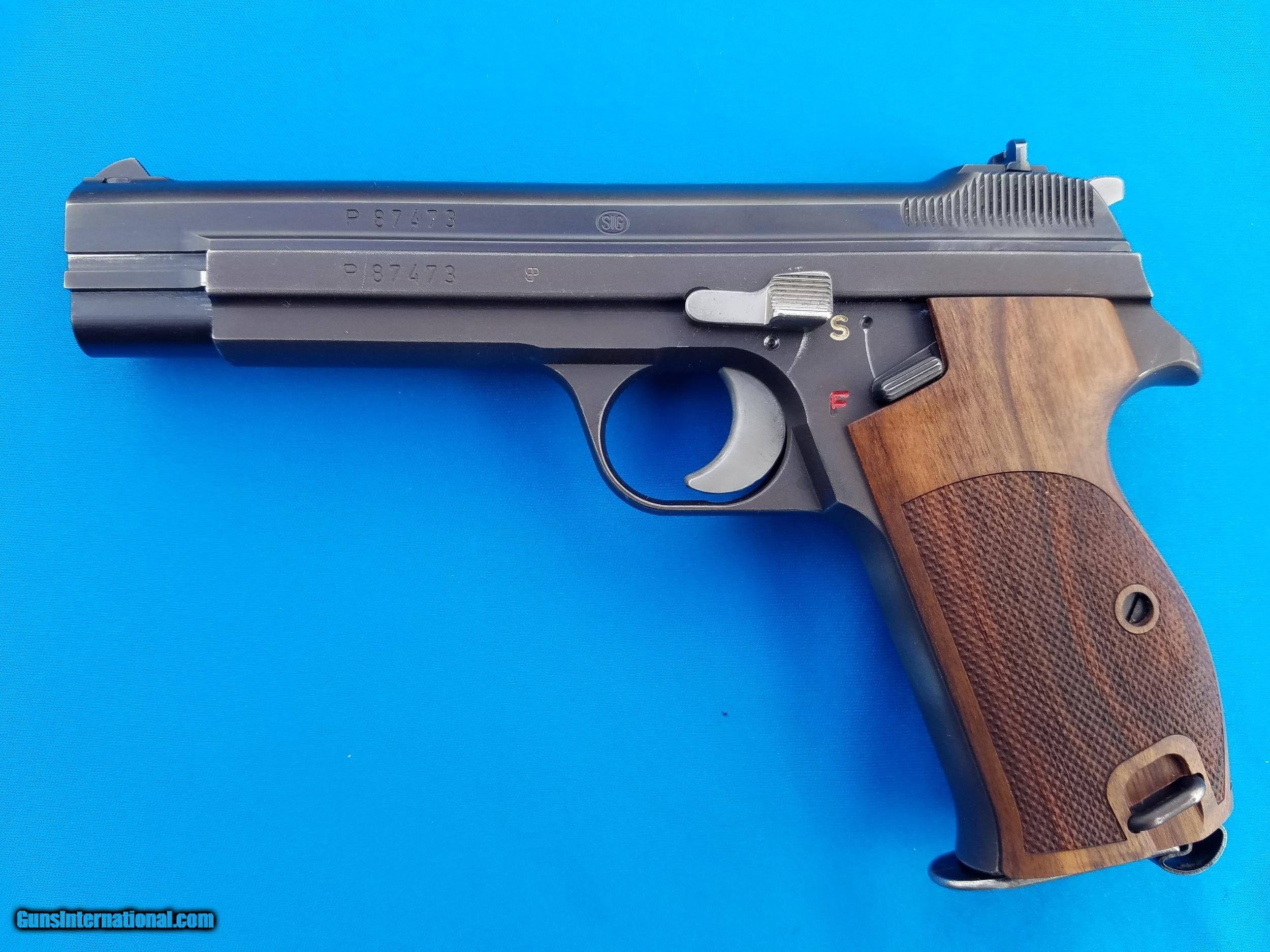 SIG-210-Swiss-Pistol-9mm-Extra-Magazine-and-Grips-Ca-1978_101291468_69275_FDDDE02EBFCA24051.jpg